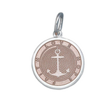 A sterling silver Lola pendant in pink with an enamel inlay in the shape of an anchor and a circular design, featuring the engraved text 'DON'T GIVE UP THE SHIP.'. BAvailable at Be Charmed