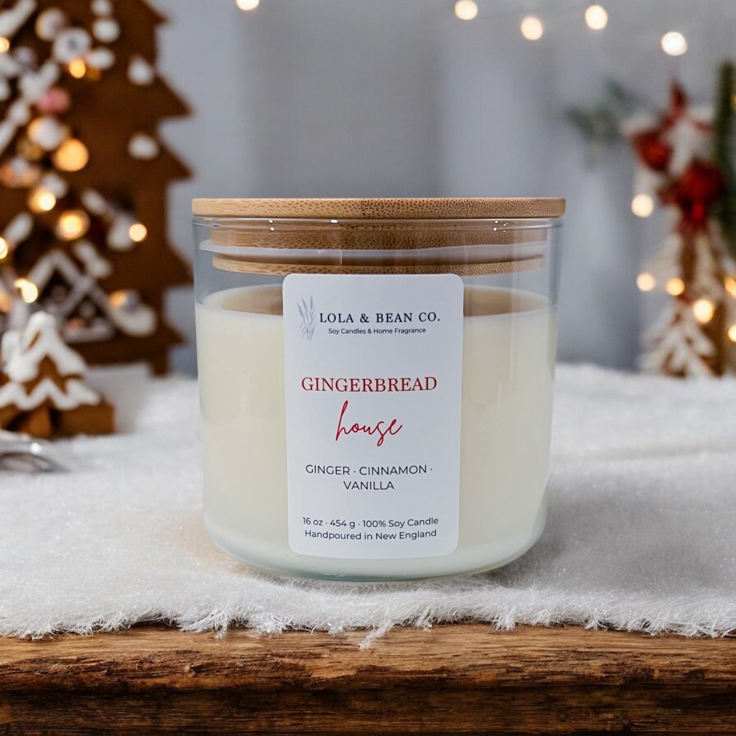Lola & Bean 3-Wick Soy Candle in Gingerbread House — warm holiday scent with cinnamon, clove, and vanilla. Available at Be Charmed