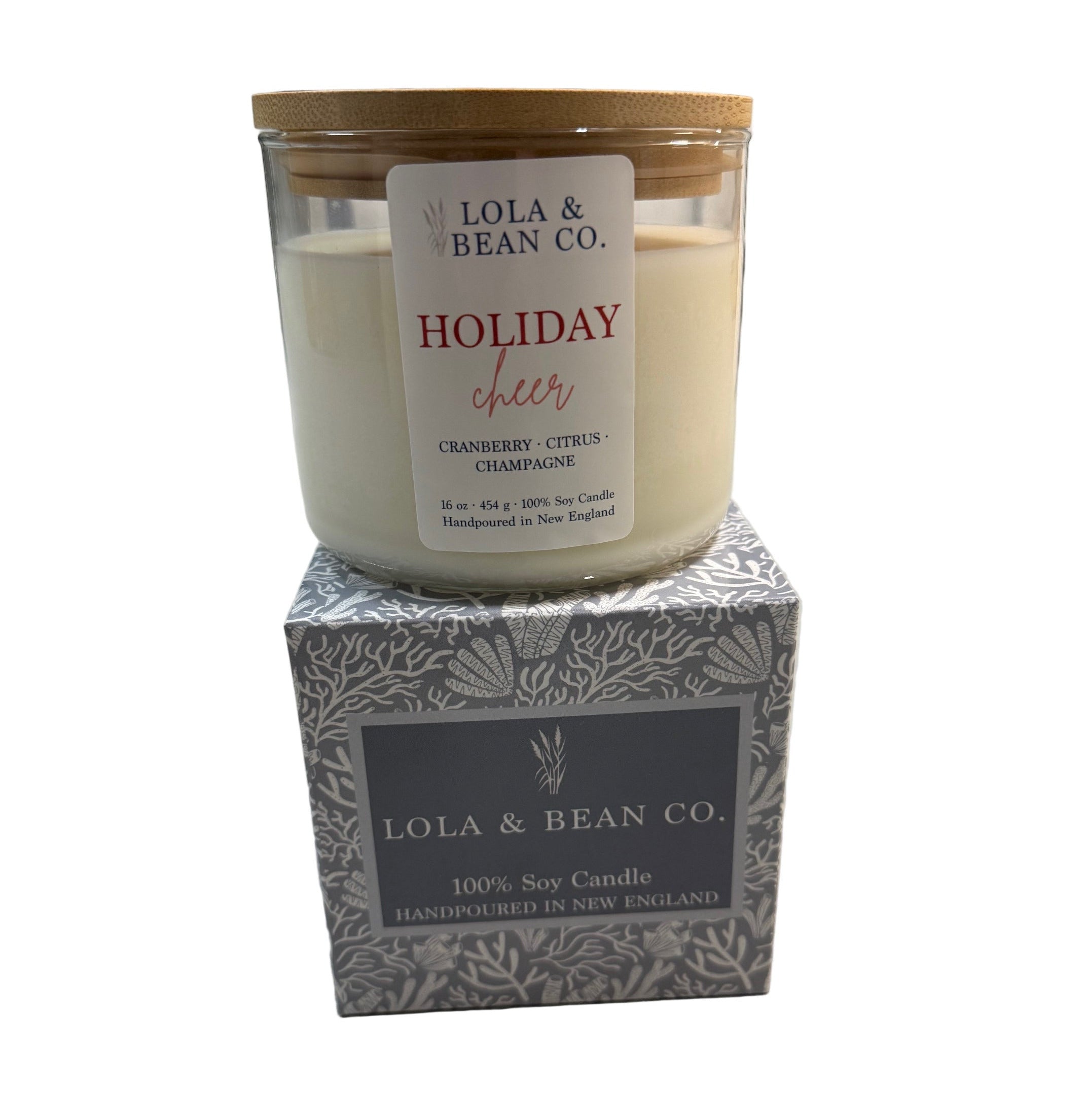 Lola & Bean 3 Wick Soy Candle Holiday Cheer on box with festive holiday scent in a clean-burning soy blend, available at Be Charmed.