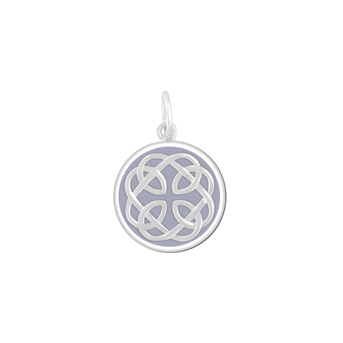 A Lola silver pendant with an lavender enamel inlay design, featuring a geometric pattern and the text 'I loved her first'. Available at Be Charmed