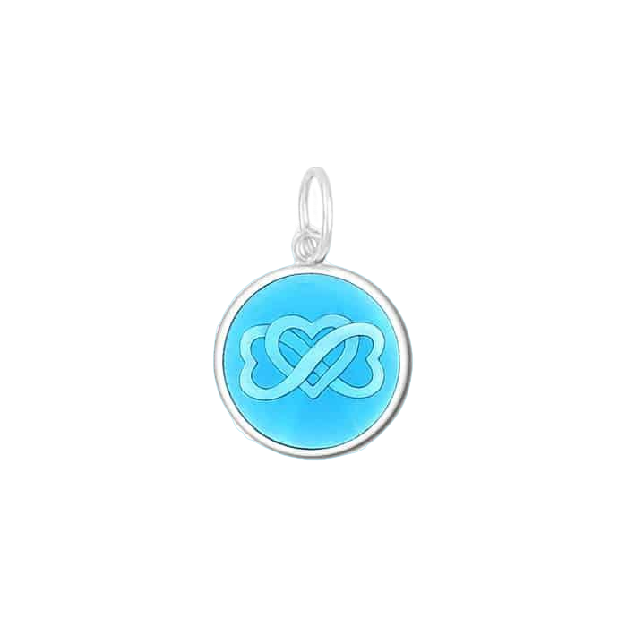 A sterling silver pendant with an Light Blue enamel inlay, featuring a circular design with what appears to be a stylized heart or geometric symbol in blue. Available at Be Charmed