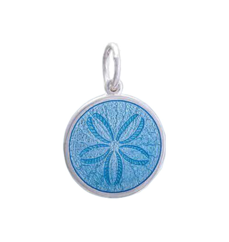 A sterling silver pendant with a light blue enamel inlay, featuring an engraved design resembling a sand dollar. Available at Be Charmed