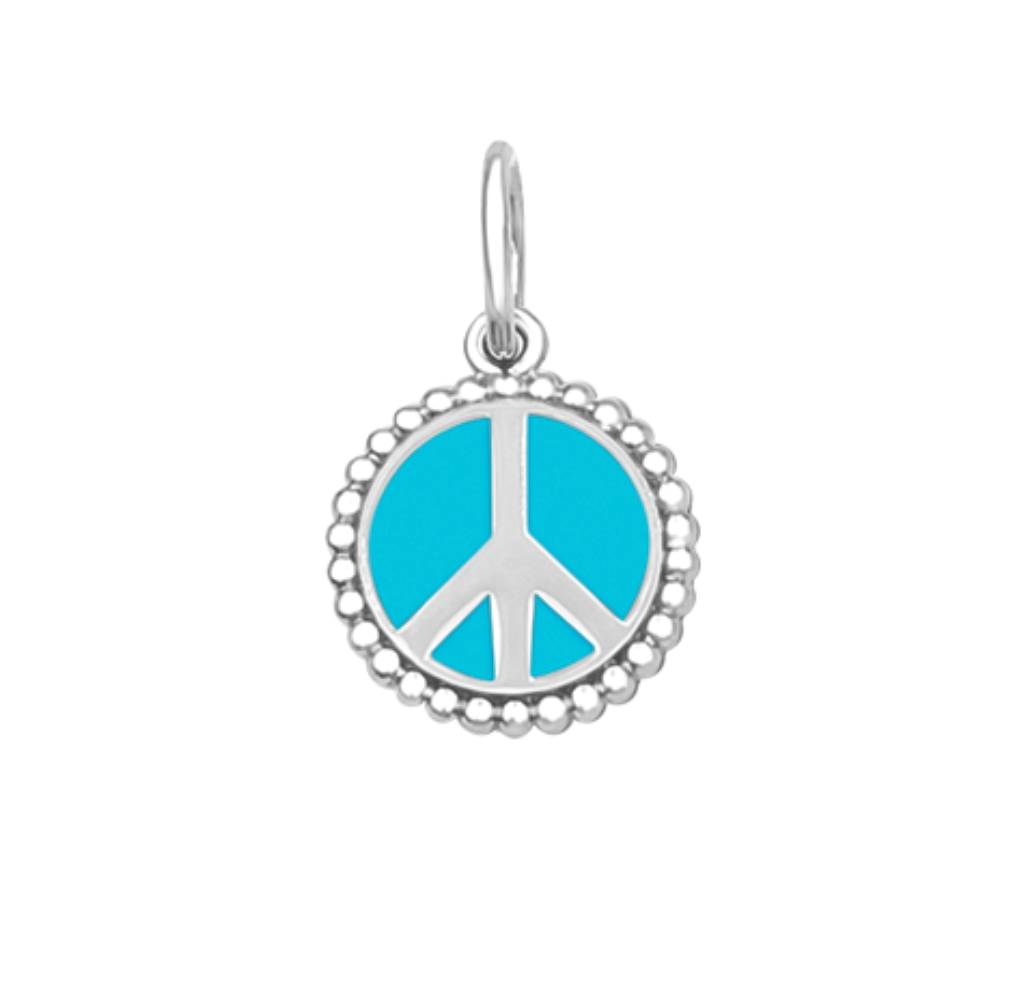 A sterling silver peace sign pendant with a turquoise enamel inlay and beaded border. Available at Be Charmed