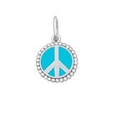 A sterling silver peace sign pendant with a turquoise enamel inlay and beaded border. Available at Be Charmed