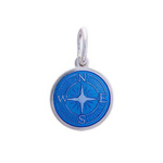 A sterling silver pendant with a blue enamel inlay designed to resemble a compass. Availble at Be Charmed