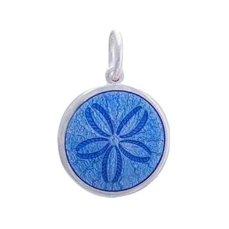 A sterling silver pendant with a periwinkl enamel inlay, featuring an engraved design resembling a sand dollar. Available at Be Charmed