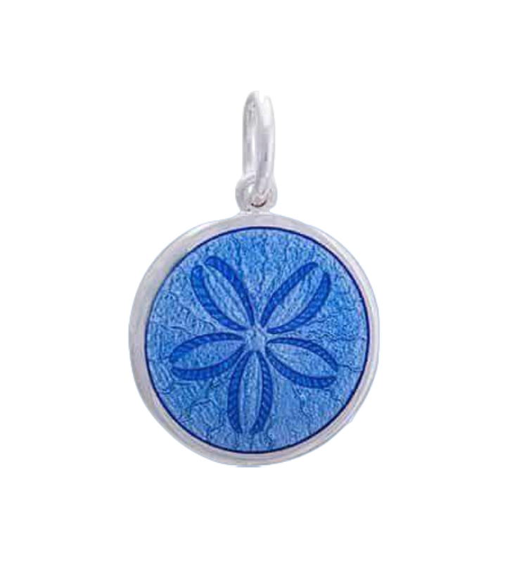 A sterling silver pendant with a periwinkl enamel inlay, featuring an engraved design resembling a sand dollar. Available at Be Charmed
