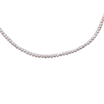 A Lola silver-colored pearl choker necklace with a series of round white pearls and a lobster clasp. Available at Be Charmed