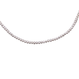 A Lola silver-colored pearl choker necklace with a series of round white pearls and a lobster clasp. Available at Be Charmed