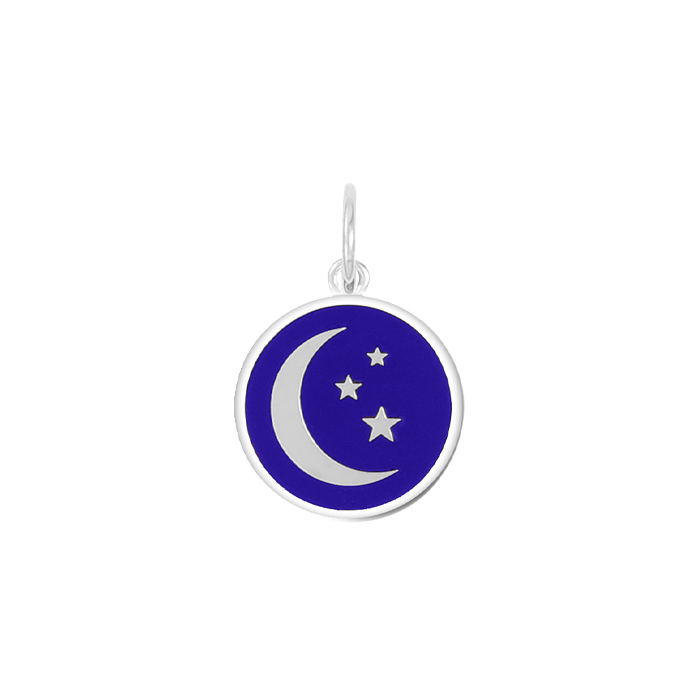 A Lola Royal Blue silver pendant featuring a blue crescent moon and five stars against a transparent background. Available at Be Charmed