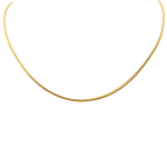 A gold wheat chain necklace with a thin design, likely made from 24 karat gold plate over 925 sterling silver. Available at Be Charmed