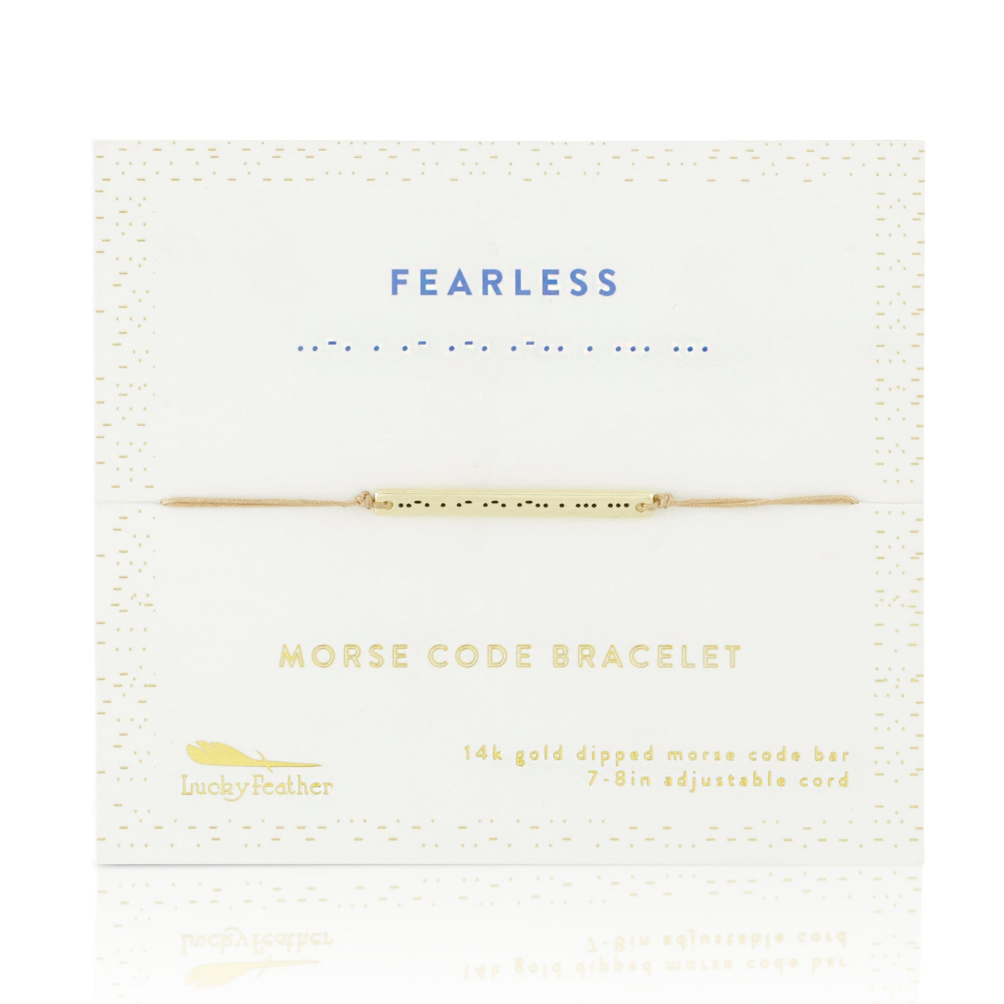 Lucky Feather Fearless Morse Code Bracelet on card featuring a gold-dipped bar engraved with 'Fearless' in Morse code, on an adjustable cord. Available at Be Charmed.