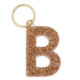 Lucky Feather Initial B Keychain featuring glittery acrylic letter charm with gold-tone hardware, personalized for each letter. Available at Be Charmed.