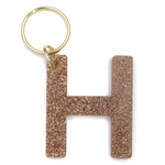 Lucky Feather Initial H Keychain featuring glittery acrylic letter charm with gold-tone hardware, personalized for each letter. Available at Be Charmed.