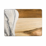Wooden cutting board with marble pattern on a white background. Available at Be Charmed