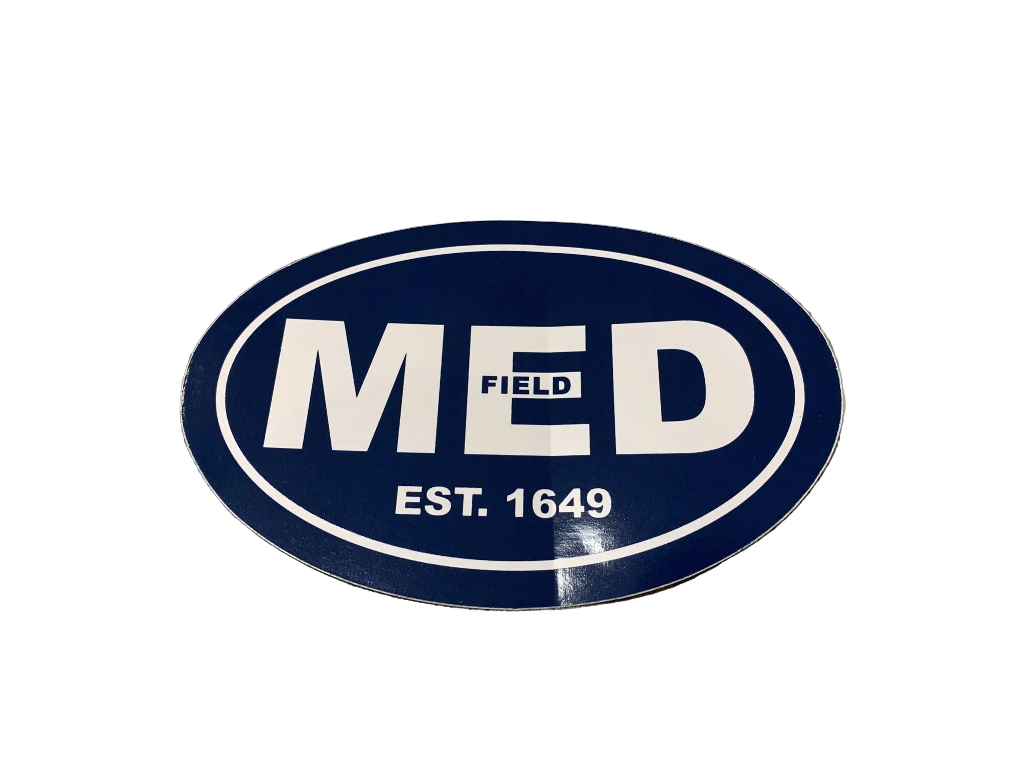 A navy-colored oval car sticker with the text MED, 'MEDFIELD' and EST. 1649. 