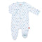 A white Magnetic Me baby footie with an airplane pattern and magnetic closures. Available at Be Charmed