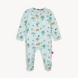 Magnetic Me Central Bark Modal Footie featuring a playful dog print on a soft blue background, designed for easy dressing. Available at Be Charmed.