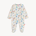 Magnetic Me Footie in Bach & Roll – ultra-soft baby footie with magnetic closures for easy changes, featuring a playful musical print, made with eco-friendly modal fabric, available at Be Charmed.