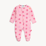 Magnetic Me Footie in Cosmic Confetti with Foil – ultra-soft modal baby footie with shimmery foil accents and magnetic closures for easy changes, perfect for stylish comfort, available at Be Charmed.