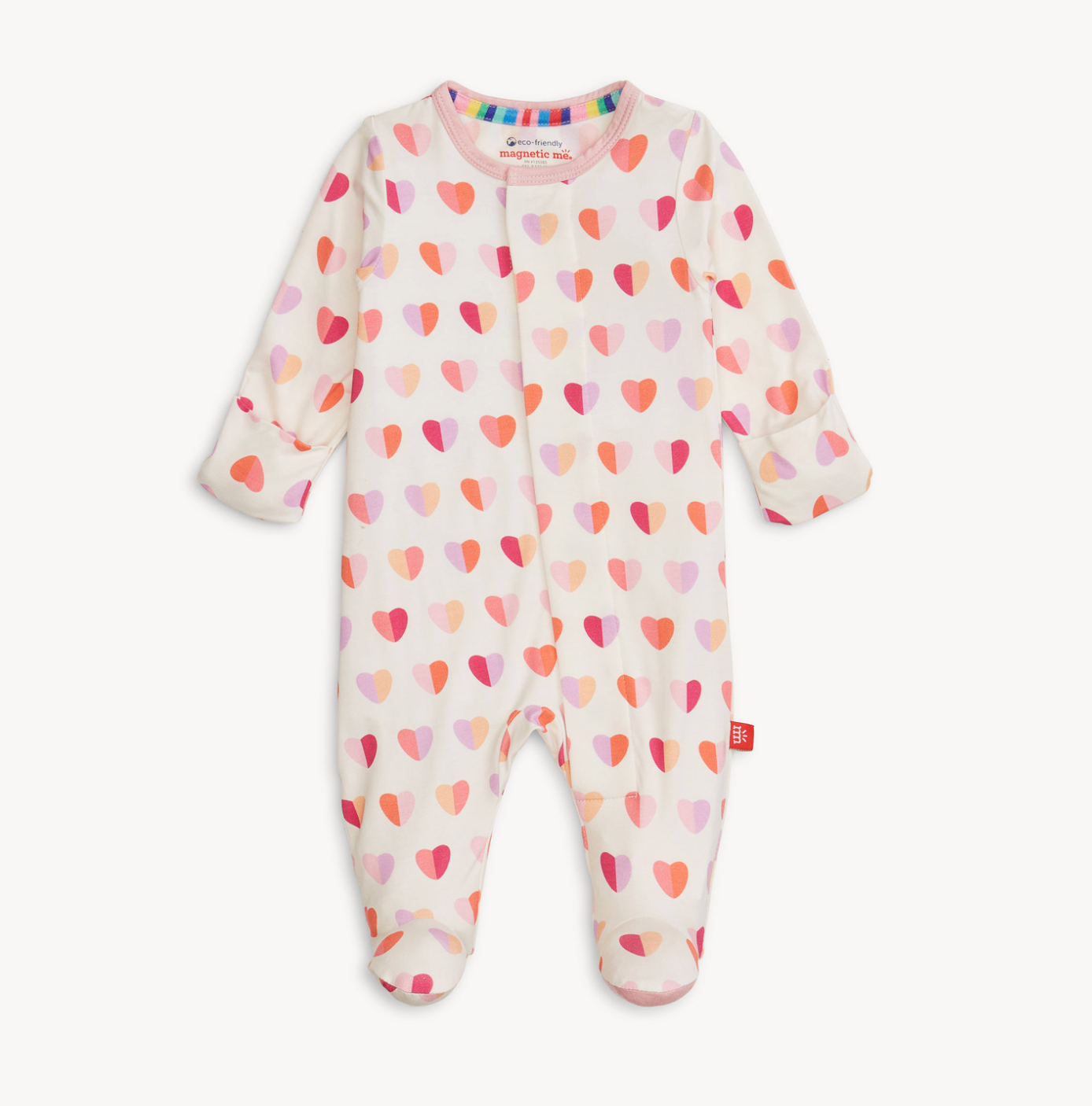 Magnetic Me Baby footie with heart pattern on a white background. Be Charmed
