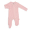A pink dogwood Magnetic Me modal footie for babies with magnetic closures, visible from the neck to upper thigh. Available at Be Charmed