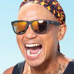 Man Wearing Goodr Whiskey Shots With Satan Sunglasses. Available at Be Charmed