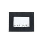 A black 4 x 6 picture frame with a white mat and the Mariposa brand name on the front. Available at Be Charmed