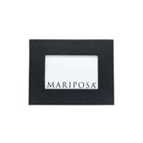 A black 4 x 6 picture frame with a white mat and the Mariposa brand name on the front. Available at Be Charmed