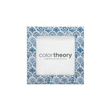 Decorative photo frame with blue and white pattern on a white background, featuring 'color theory' by Mariposa. Available at Be Charmed. 