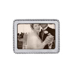 A beaded silver 4x6  Mariposa picture frame, displaying a black and white photo of a couple. Available at Be Charmed