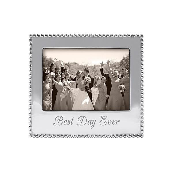 Mariposa Beaded 5x7 Frame “Best Day Ever” — handcrafted recycled-aluminum photo frame with signature beaded border and engraved sentiment, perfect for wedding, engagement, or celebration memories. Available at Be Charmed.