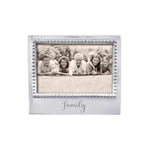 A beaded frame with a family photo, specifically designed to fit a 4 x 6 picture. Available at Be Charmed
