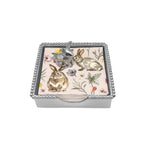 Decorative napikn box with rabbit and flower design on a white background. Available at Be Charmed