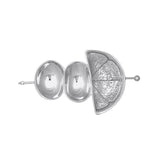 Silver garnish dish design on a white background. Available at Be Charmed
