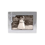 A silver picture frame with a cross accent on the side, containing a black and white photo of a child. Available at Be Charmed
