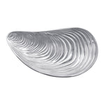 Metal dish with wavy design on a white background. Available at Be Charmed