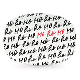 A round, white serving platter with 'ho ho ho' text in black and red. Available at Be Charmed
