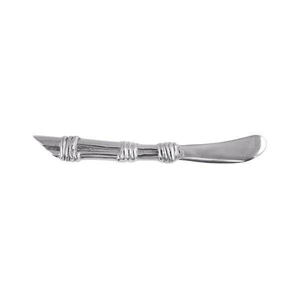 Mariposa Rattan Spreader with handwoven rattan handle and polished recycled aluminum blade — perfect for butter, cheese, or spreads. Elegant tableware available at Be Charmed.