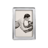 A silver aluminum 4x6 mariposa picture frame with an image of a mother and child. Available at Be Charmed