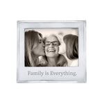 A 5x7 Mariposa picture frame with a quote 'Family is Everything' on the bottom, featuring an image of two adults and a child kissing cheeks. Available at Be Charmed