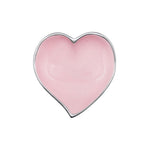 Heart-shaped pink trinket dish on a white background. Available at Be Charmed