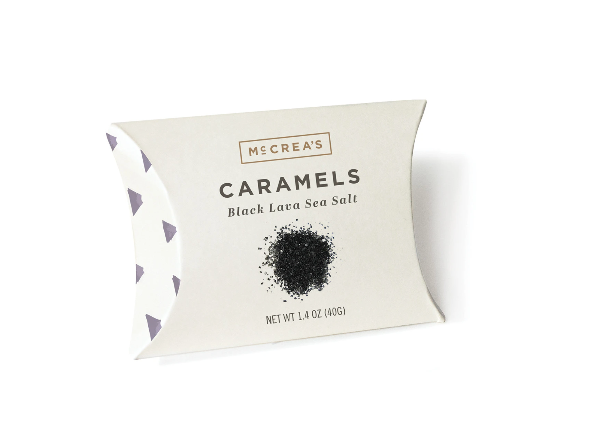 Individually wrapped caramels in a pillow box with 'McCrea's Candies Black Lava Sea Salt' printed on the label. Available at Be Charmed