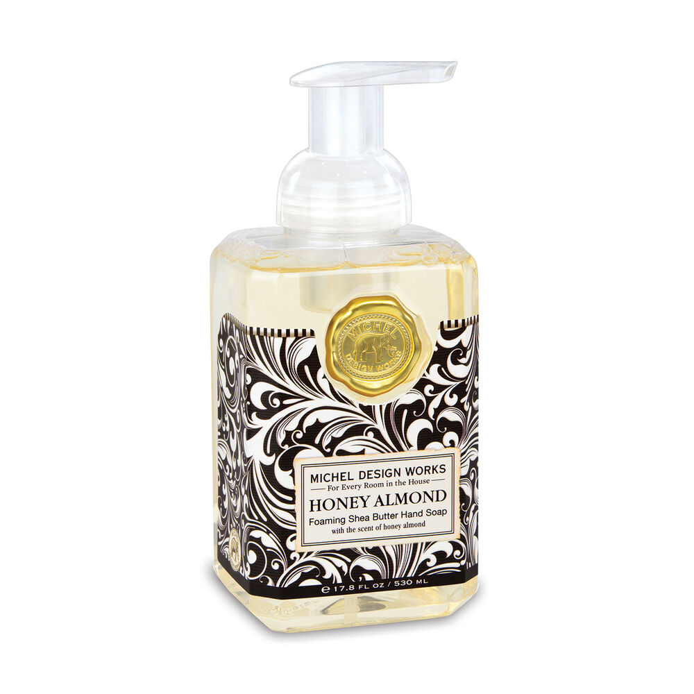 Foaming hand soap bottle with decorative label on a white background. Available at Be Charmed