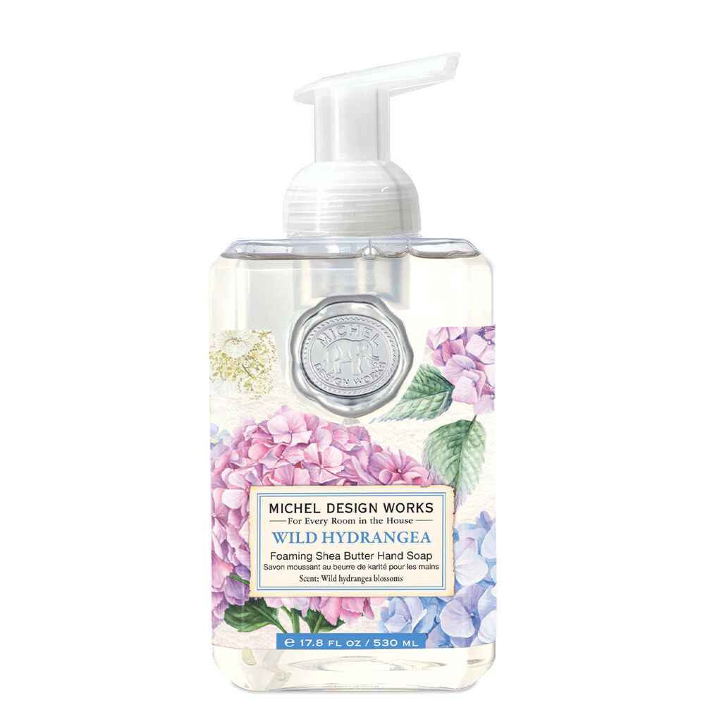 Foaming hand soap bottle with floral design and Michel Design Works branding on a white background. Available at Be Charmed
