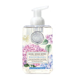 Foaming hand soap bottle with floral design and Michel Design Works branding on a white background. Available at Be Charmed