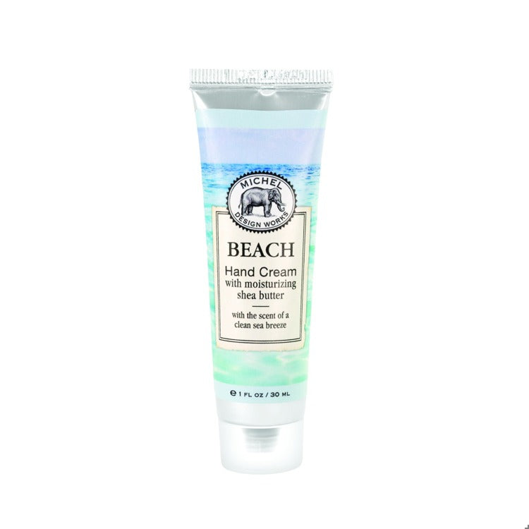 Tube of Beach Hand Cream with a scenic label on a white background. Available at Be Charmed