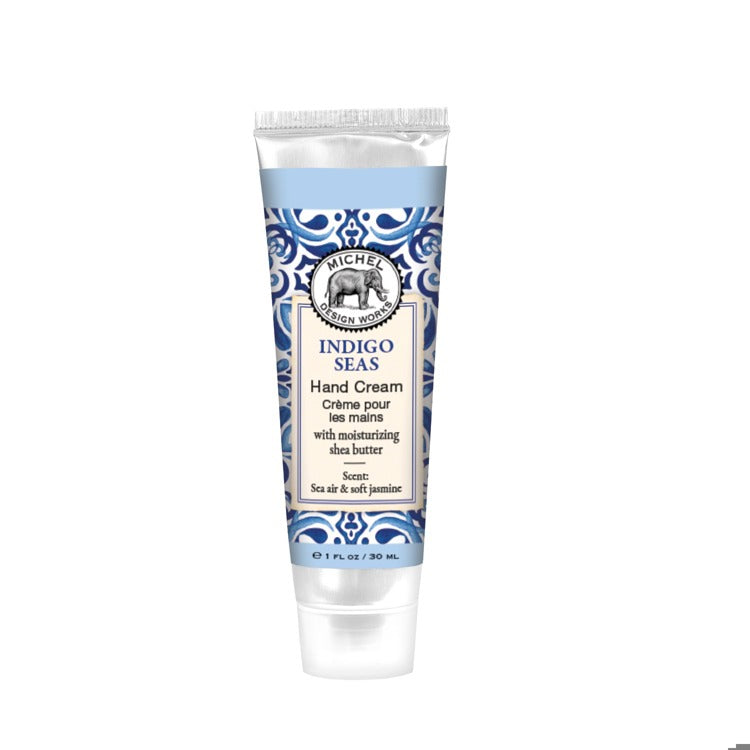 Tube of Indigo Seas hand cream with decorative label on a white background. Available at Be Charmed