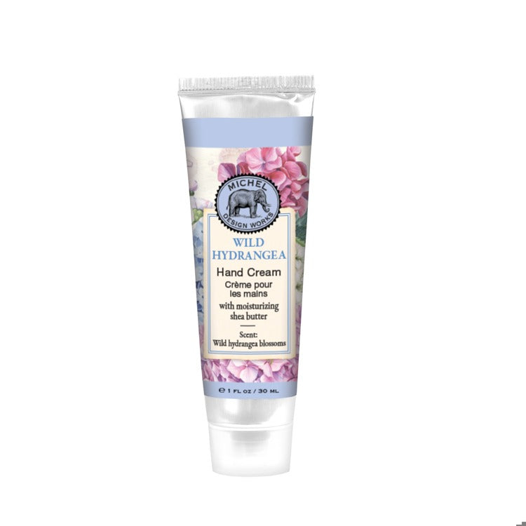 Hand cream tube with floral design on a white background. Available at Be Charmed