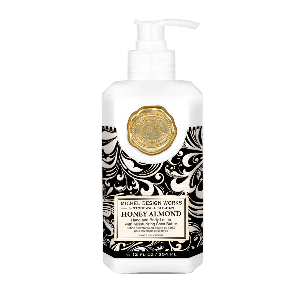 Lotion bottle with decorative label on a white background. Available at Be Charmed
